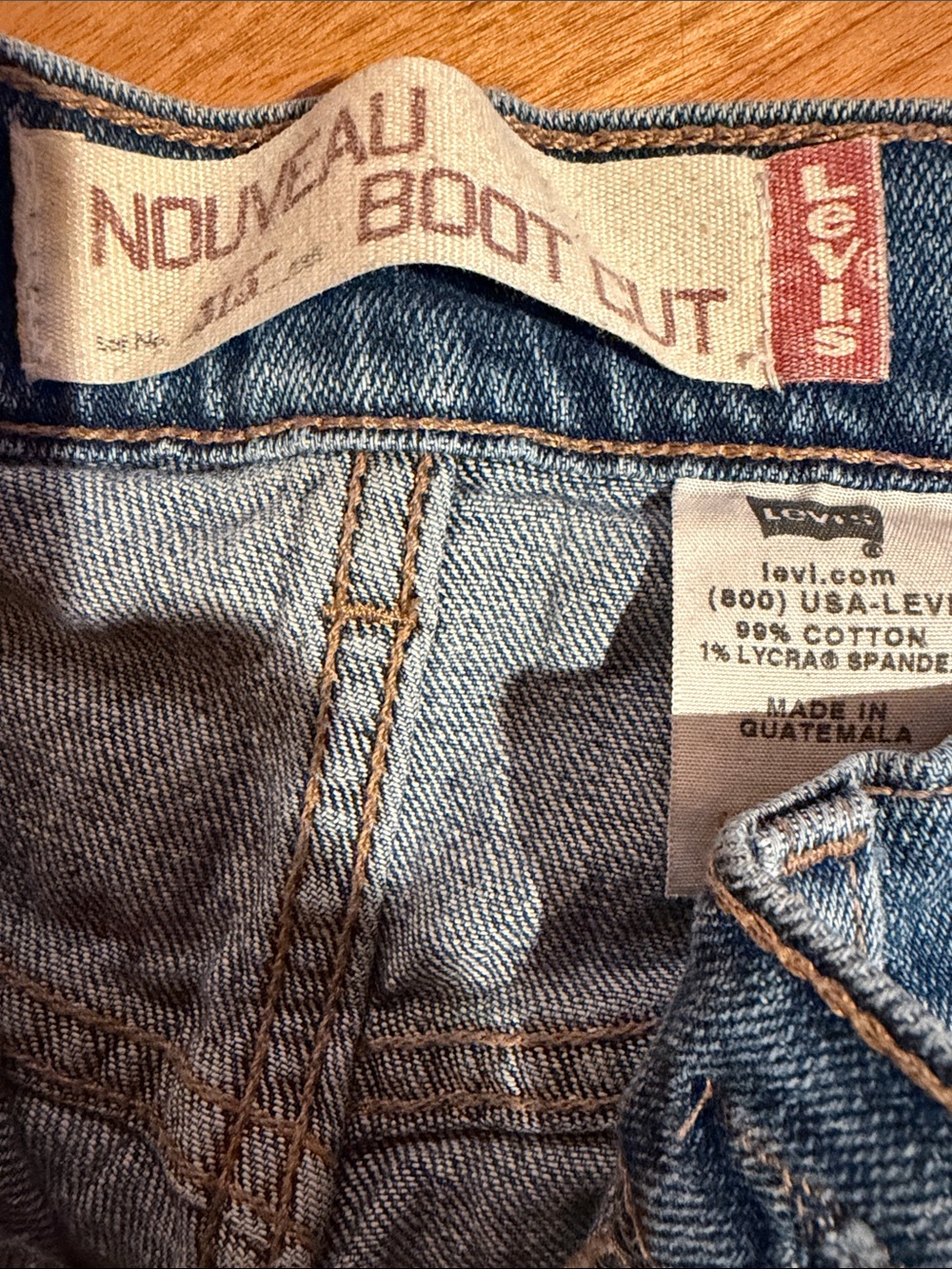 Levi's Light Blue Denim Bootcut Jeans with Brown Stitching